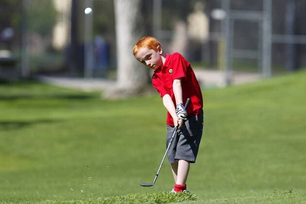July 14, 2015 - San Diego, California, United States - July 14, 2015_San Diego, CA_USA_ Louis Rickett hits during the Junior World Golf Championships 6 and under division at Colina Park Golf Course. Photo by Louis Rickett hits during the Junior World Golf Championships 6 and under division at Colina Park Golf Course. - ZUMAs44_