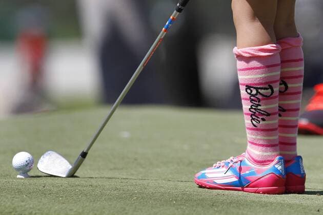 July 14, 2015 - San Diego, California, United States - July 14, 2015_San Diego, CA_USA_ Miyu Shimizu, wearing Barbie socks, plays during the Junior World Golf Championships 6 and under division at Colina Park Golf Course. Photo by Miyu Shimizu, wearing Barbie socks, plays during the Junior World Golf Championships 6 and under division at Colina Park Golf Course. - ZUMAs44_