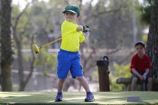 July 14, 2015 - San Diego, California, United States - July 14, 2015_San Diego, CA_USA_ James Grimes III, 4, tees off during the first round of the Junior World Golf Championships 6 and under division at Colina Park Golf Course. Photo by James Grimes III, 4, tees off during the first round of the Junior World Golf Championships 6 and under division at Colina Park Golf Course. - ZUMAs44_