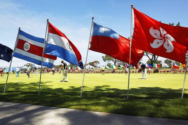 July 14, 2015 - San Diego, California, United States - July 14, 2015_San Diego, CA_USA_ Junior golfers putt on the practice green for the Junior World Golf Championships at Torrey Pines Golf Course. Photo by Junior golfers putt on the practice green for the Junior World Golf Championships at Torrey Pines Golf Course. - ZUMAs44_