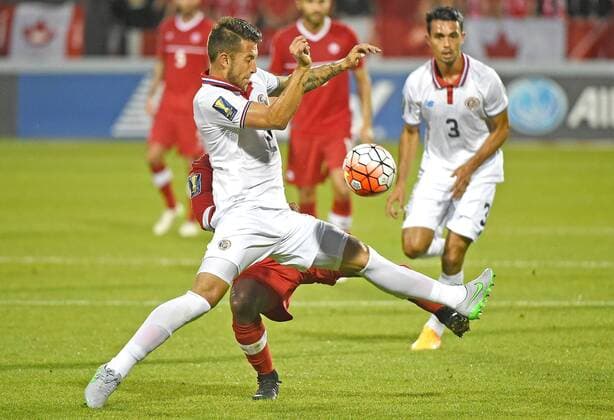 July 14, 2015: Costa Rica defender Francisco Calvo (2) clears the all away from Canada midfielder Julian De Guzman (6) as defender Giancarlo Gonzalez (3) watches during the first half of a Gold Cup match at BMO Field, Toronto, ON. SOCCER: JUL 14 CONCACAF Gold Cup - Group Stage - Canada v Costa Rica Icon15071403 EDITORIAL USE ONLY