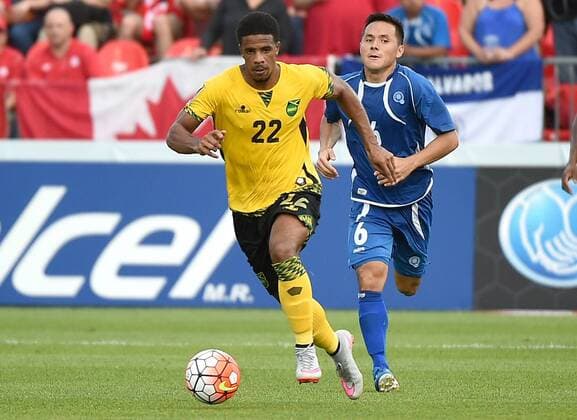 July 14, 2015: Jamaica midfielder Gareth McCleary (22) runs with the ball past El Salvador midfielder Richard Menjivar in the second half of their Gold Cup match at BMO Field, Toronto. McCleary scored the winning goal. SOCCER: JUL 14 CONCACAF Gold Cup - Group Stage - Jamaica v El Salvador Icon15071419 EDITORIAL USE ONLY