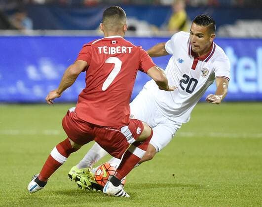 July 14, 2015: Costa Rica midfielder David Guzman (20) eludes the marking efforts of Canada midfielder Russell Teibert (7) during the second half of a Gold Cup match at BMO Field, Toronto, ON. SOCCER: JUL 14 CONCACAF Gold Cup - Group Stage - Canada v Costa Rica Icon15071420 EDITORIAL USE ONLY