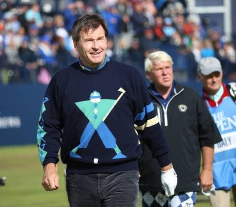 Great Britain s Nick Faldo smiles with fellow players in the Champion s Challenge ahead of the start of the144th Open Championship, St.Andrews on July 15, 2015.  LON2015071515 HUGOxPHILPOTT