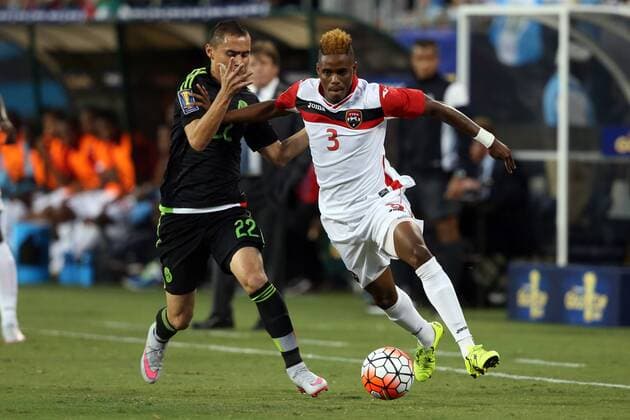 Aktuell Fußball, Gold Cup, Mexiko - Trinidad und Tobago 15 July 2015: Joevin Jones (TRI) (3) and Paul Aguilar (MEX) (22). The Mexico Men s national team Nationalteam played the Trinidad & Tobago Men s National Team at Bank of America Stadium in Charlotte, NC in a 2015 CONCACAF Gold Cup Group C match. SOCCER: JUL 15 CONCACAF Gold Cup - Group Stage - Mexico v Trinidad Icon918150715204 EDITORIAL USE ONLY