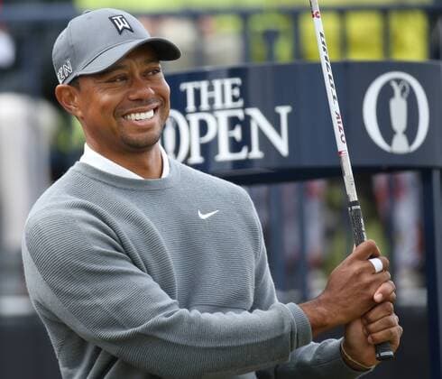 Aktuell Golf - The 144th Open Championship American Tiger Woods smiles on the 16th tee on the first day of the 144th Open Championship in St.Andrews, Scotland on July 16, 2015.  LON2015071649 HUGOxPHILPOTT