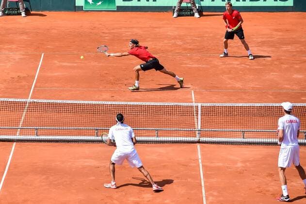 - MIDDELKERKE, BELGIUM: Belgian Ruben Bemelmans and Belgian Kimmer Coppejans pictured during the third game, a double match between Belgians Ruben Bemelmans and Kimmer Coppejans and Canadians Daniel Nestor and Adil Shamasdin at the Davis Cup quarter final World Group meeting between Belgium and Canada, Saturday 18 July 2015 in Middelkerke. LUCxCLAESSEN  x04666856x