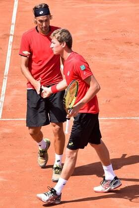 - MIDDELKERKE, BELGIUM: Belgian Ruben Bemelmans and Belgian Kimmer Coppejans celebrate during the third game, a double match between Belgians Ruben Bemelmans and Kimmer Coppejans and Canadians Daniel Nestor and Adil Shamasdin at the Davis Cup quarter final World Group meeting between Belgium and Canada, Saturday 18 July 2015 in Middelkerke. LUCxCLAESSEN  x04666865x
