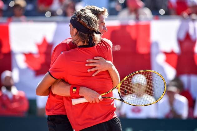 - MIDDELKERKE, BELGIUM: Belgian Ruben Bemelmans and Belgian Kimmer Coppejans celebrate after winning the third game, a double match between Belgians Ruben Bemelmans and Kimmer Coppejans and Canadians Daniel Nestor and Adil Shamasdin at the Davis Cup quarter final World Group meeting between Belgium and Canada, Saturday 18 July 2015 in Middelkerke. LUCxCLAESSEN  x04666963x