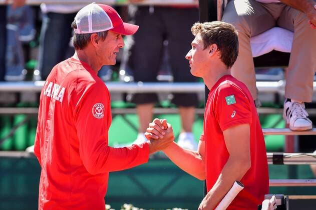 - MIDDELKERKE, BELGIUM: Canada s captain Martin Laurendeau and Belgian Kimmer Coppejans pictured after the fourth game between Belgian Kimmer Coppejans and Canadian Frank Dancevic at the Davis Cup quarter final World Group meeting between Belgium and Canada, Sunday 19 July 2015 in Middelkerke. Belgium leads 3-0 and qualified for the semi-finals. LUCxCLAESSEN  x04667270x