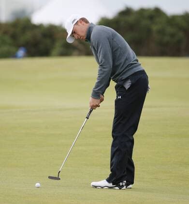American Jordan Spieth putts on the eigth hole during the third round at the 144th Open Championship, St.Andrews on July 19 2015.  LON2015071908 HUGOxPHILPOTT
