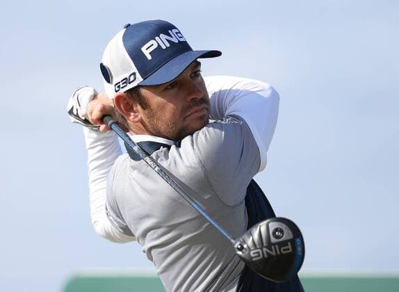 South African s Louis Oosthuizen tees off on the sixteenth hole during the third round at the 144th Open Championship, St.Andrews on July 19 2015.  LON2015071938 HUGOxPHILPOTT