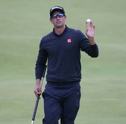 Australian Adam Scott smiles on the eighteenth green during the third round at the 144th Open Championship, St.Andrews on July 19 2015.  LON2015071956 HUGOxPHILPOTT