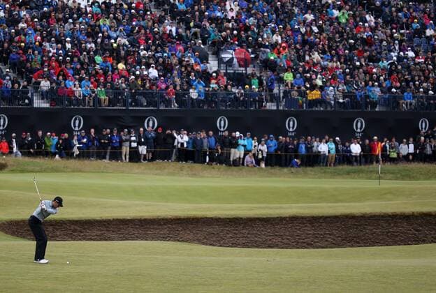 Spain s Sergio Garcia plays a shot into the 7th green during the third round at the 144th Open Championship, St.Andrews on July 19 2015.  LON2015071921 HUGOxPHILPOTT