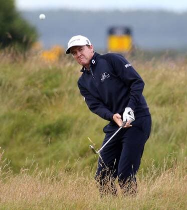 American Jimmy Walker chips onto the seventeenth green during the third round at the 144th Open Championship, St.Andrews on July 19 2015.  LON2015071928 HUGOxPHILPOTT