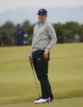 American Jordan Spieth smiles on the 5th green during the final round at the 144th Open Championship, St.Andrews on July 20 2015.  LON2015072009 HUGOxPHILPOTT