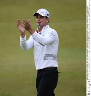 Aktuell Golf - Zach Johnson gewinnt im Stechen die British Open - The 144th Open Championship American Zach Johnson applauds the spectators after winning the 144th Open Championship, St.Andrews on July 20 2015. Zach Johnson won in a playoff against Louis Oosthuizen and Marc Leishman.  LON2015072033 HUGOxPHILPOTT