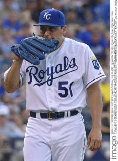 July 21, 2015 - Kansas City, MO, USA - Kansas City Royals pitcher Jason Vargas bites his glove in pain in the second inning after throwing a pitch and coming out of the game against the Pittsburgh Pirates on Tuesday, July 21, 2015, at Kauffman Stadium in Kansas City, Mo. Pittsburgh at Kansas City - ZUMAm67_