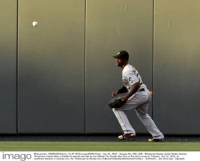 July 21, 2015 - Kansas City, MO, USA - Pittsburgh Pirates center fielder Andrew McCutchen chases after a double hit against the wall by the Kansas City Royals Alex Rios in the third inning on Tuesday, July 21, 2015, at Kauffman Stadium in Kansas City, Mo. Pittsburgh at Kansas City - ZUMAm67_