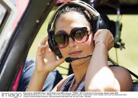 TENNIS - WTA Tennis Damen Nuernberger Gastein Ladies BAD GASTEIN,AUSTRIA,22.JUL.15 - TENNIS - WTA Tour, Nuernberger Gastein Ladies. Image shows Tamira Paszek (AUT) during a helicopter flight. GEPAxpictures xMatthiasxHauer