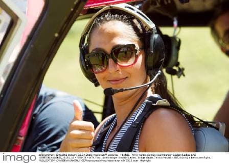 TENNIS - WTA Tennis Damen Nuernberger Gastein Ladies BAD GASTEIN,AUSTRIA,22.JUL.15 - TENNIS - WTA Tour, Nuernberger Gastein Ladies. Image shows Tamira Paszek (AUT) during a helicopter flight. GEPAxpictures xMatthiasxHauer