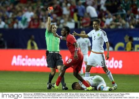 22 July 2015: Referee Mark Geiger (USA) shows the red card to Luis Tejeda (PAN) (10) for a foul on Francisco Javier Rodriguez (MEX) (on the ground) as Diego Reyes (MEX) (5) watches. The Panama Men s national team Nationalteam played the Mexico Men s National Team at the Georgia Dome in Atlanta, Georgia in a 2015 CONCACAF Gold Cup semifinal match. SOCCER: JUL 22 CONCACAF Gold Cup - Semifinals - Panama v Mexico Icon918150722211 EDITORIAL USE ONLY