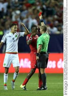 22 July 2015: Referee Mark Geiger (USA) shows the red card to Luis Tejeda (PAN) (10) as Diego Reyes (MEX) (5) watches. The Panama Men s national team Nationalteam played the Mexico Men s National Team at the Georgia Dome in Atlanta, Georgia in a 2015 CONCACAF Gold Cup semifinal match. SOCCER: JUL 22 CONCACAF Gold Cup - Semifinals - Panama v Mexico Icon918150722213 EDITORIAL USE ONLY