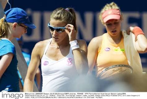 TENNIS - WTA Tennis Damen Nuernberger Gastein Ladies BAD GASTEIN,AUSTRIA,23.JUL.15 - TENNIS - WTA Tour, Nuernberger Gastein Ladies, doubles. Image shows Alicja Rosolska (POL) and Laura Siegemund (GER). GEPAxpictures xMatthiasxHauer