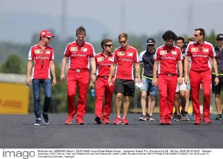 Hungarian Grand Prix, Hungaroring 23 - 26 July 2015 23.07.2015 - Esteban Gutierrez (MEX) Ferrari Test and Reserve Driver and Sebastian Vettel (GER) Scuderia Ferrari SF15-T 