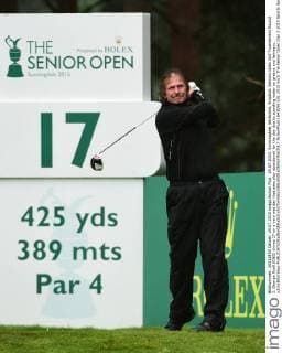 24.07.2015. Sunningdale, Berkshire, England. Seniors Open Golf Tournament Round 2. George Ryall (ENG) drives 17 on a very wet day that sees play abandoned for the day due to standing water on greens and fairways. xJonxBromleyx  ActionPlus11643050