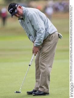 Golf - 2015 Senior Open Championship - Sunningdale Golf Club. Marco Dawson lines up his putt on the 18th hole at Sunningdale Golf Club. COLORSPORT DANIEL BEARHAM 