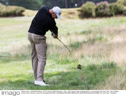 Golf - 2015 Senior Open Championship - Sunningdale Golf Club. Rear view of Peter Fowler with a fairway shot at Sunningdale Golf Club. COLORSPORT DANIEL BEARHAM 