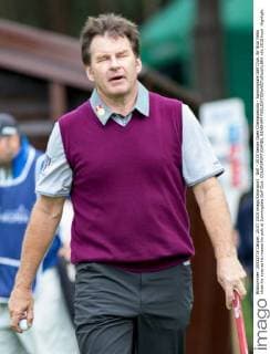 Golf - 2015 Senior Open Championship - Sunningdale Golf Club. Sir Nick Faldo close his eyes as he misses his putt at Sunningdale Golf Club. COLORSPORT DANIEL BEARHAM 