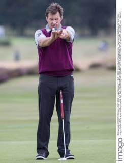 Golf - 2015 Senior Open Championship - Sunningdale Golf Club. Sir Nick Faldo checks the lay of the green at Sunningdale Golf Club. COLORSPORT DANIEL BEARHAM 
