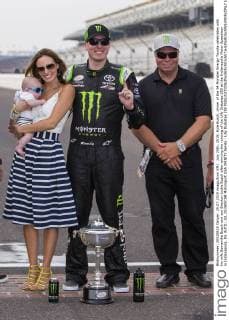 July 25th, 2015: Kyle Busch, driver of the 54 Monster Energy Toyota celebrates with his wife Samantha Busch and son Brexton Locke Busch after winning the running of the Lilly Diabetes 250 at the Indianapolis Motor Speedway in Indianapolis, IN. AUTO: JUL 25 NASCAR Motorsport USA XFINITY Series - Lilly Diabetes 250 Icon150725025250 EDITORIAL USE ONLY