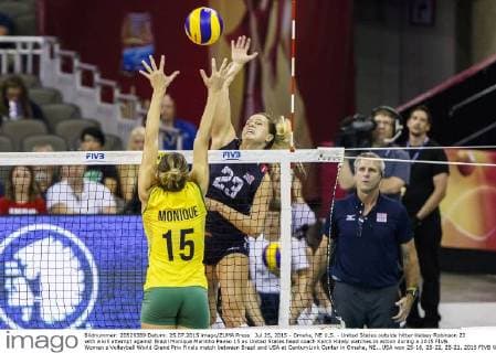 Jul 25, 2015 - Omaha, NE U.S. - United States outside hitter Kelsey Robinson 23 with a kill attempt against Brazil Monique Marinho Pavao 15 as United States head coach Karch Kiraly watches in action during a 2015 FIVB Women s Volleyball World Grand Prix Finals match between Brazil and USA at CenturyLink Center in Omaha, NE...USA won 25-16, 25-22, 25-21. 2015 FIVB Women s Volleyball Grand Prix Final Round: Brazil vs USA Jul 25 - ZUMAc04_