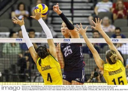 Jul 25, 2015 - Omaha, NE U.S. - United States outside hitter Karsta Lowe 25 attempts a kill against Brazil defenders Brazil Ana Carolina Da Silva 4 and Brazil Monique Marinho Pavao 15 in action during a 2015 FIVB Women s Volleyball World Grand Prix Finals match between Brazil and USA at CenturyLink Center in Omaha, NE...USA won 25-16, 25-22, 25-21. 2015 FIVB Women s Volleyball Grand Prix Final Round: Brazil vs USA Jul 25 - ZUMAc04_