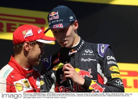 Hungarian Grand Prix, Hungaroring 23 - 26 July 2015 26.07.2015 - Race, 1st position Sebastian Vettel (GER) Scuderia Ferrari SF15-T and 2nd position Daniil Kvyat (RUS) Red Bull Racing RB11 