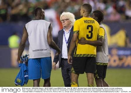 July 26, 2015: Jamaica head coach Winfried Schafer tries to console goalkeeper Ryan Thompson (23) and defender Michael Hector (3) following the CONCACAF Gold Cup 2015 Final match between Jamaica and Mexico at Lincoln Financial Field in Philadelphia, Pennsylvania. Mexico won 3-1. Soccer 2015: Jamaica vs Mexico JUL 26 - ZUMAc04_