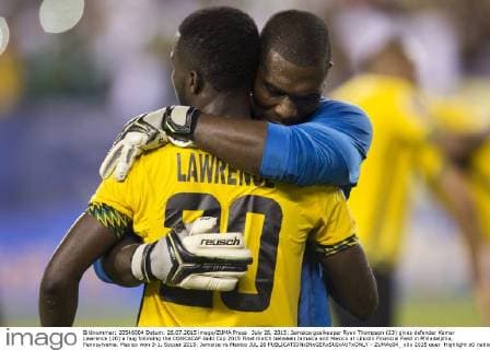 July 26, 2015: Jamaica goalkeeper Ryan Thompson (23) gives defender Kemar Lawrence (20) a hug following the CONCACAF Gold Cup 2015 Final match between Jamaica and Mexico at Lincoln Financial Field in Philadelphia, Pennsylvania. Mexico won 3-1. Soccer 2015: Jamaica vs Mexico JUL 26 - ZUMAc04_