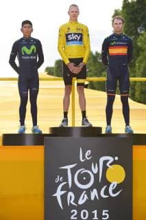Die drei Erstplatzierten v.l.n.r. (2.) Nairo Alexander QUINTANA ROJAS ( COL Movistar Team ) - (1.) Chris Christopher FROOME ( GBR Team SKY ) - (3.) Alejandro VALVERDE BELMONTE ( SPA Mobvistar Team ) bei der Anhoerung der britischen Nationalhymne des Siegers Chris FROOME (GBR) - Siegerehrung - Ehrung - Auszeichnung - Zeremonie - Zelebrierung - Ceremony - Jubel - Freude - Emotionen - Mimik - Gestik - Hochformat - hoch - vertikal - Event Veranstaltung: Le Tour de France 2015 - Stage 21 21.Etappe: Sevres Grand Paris Seine Ouest nach Paris Champs Elysees 109.5 km - Location Ort: Paris - France - Frankreich - Europe - Europa - Date Datum: 26.07.2015 Stiehl Photography