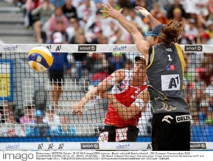Beach volleyball Beachvolleyball - CEV European Championships 2015 KLAGENFURT,AUSTRIA,30.JUL.15 - BEACH VOLLEYBALL - CEV Beach Volleyball European Championships. Image shows Lorenz Petutschnig (AUT) and Mariusz Prudel (POL). GEPAxpictures xDanielxGoetzhaber