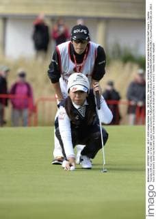 30.07.2015. Turnberry, Scotland. Ricoh Womens British Open Golf round 1. Yumiko Yoshida with her caddy on the 18th green xLorrainexHillx  ActionPlus11645100