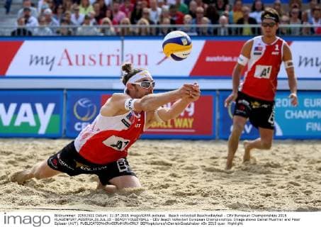 Beach volleyball Beachvolleyball - CEV European Championships 2015 KLAGENFURT,AUSTRIA,31.JUL.15 - BEACH VOLLEYBALL - CEV Beach Volleyball European Championships. Image shows Daniel Muellner and Peter Eglseer (AUT). GEPAxpictures xDanielxGoetzhaber
