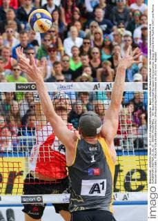 Beach volleyball Beachvolleyball - CEV European Championships 2015 KLAGENFURT,AUSTRIA,31.JUL.15 - BEACH VOLLEYBALL - CEV Beach Volleyball European Championships. Image shows Daniel Muellner (AUT) and Markus Boeckermann (GER). GEPAxpictures xMaticxKlansek