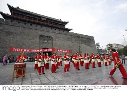 ZHANGJIAKOU, CHINA - JULY 31: (CHINA OUT) People celebrate at the Gongji Gate after Beijing was awarded as host city for the 2022 Winter Olympic Games Olympische Spiele Olympia OS on July 31, 2015 in Zhangjiakou, China.  CFP471001807 