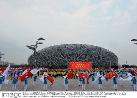 BEIJING, CHINA - JULY 31: (CHINA OUT) People celebrate in front of the National Stadium after Beijing was awarded as host city for the 2022 Winter Olympic Games Olympische Spiele Olympia OS on July 31, 2015 in Beijing, China.  CFP471004528 