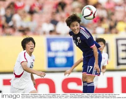 (150801) -- WUHAN, Aug. 1, 2015 -- Japan s Arimachi Saori (R) vies with Kim Nam Hui of the Democratic People s Republic of Korea (DPRK) during their match at the 2015 EAFF(East Asian Football Federation) Women s East Asian Cup in Wuhan, capital of central China s Hubei Province, Aug. 1, 2015. ) (SP)CHINA-WUHAN-FOOTBALL-EAFF WOMEN S EAST ASIAN CUP 2015-JAPAN VS DPRK XiaoxYijiu 