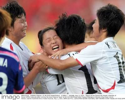 (150801) -- WUHAN, Aug. 1, 2015 -- Players of the Democratic People s Republic of Korea (DPRK) celebrate after winning the match against Japan at the 2015 EAFF(East Asian Football Federation) Women s East Asian Cup in Wuhan, capital of central China s Hubei Province, Aug. 1, 2015. DPRK won 4-2. ) (SP)CHINA-WUHAN-FOOTBALL-EAFF WOMEN S EAST ASIAN CUP 2015-JAPAN VS DPRK ChengxMin 
