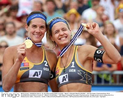 Beach volleyball Beachvolleyball - CEV European Championships 2015 KLAGENFURT,AUSTRIA,01.AUG.15 - BEACH VOLLEYBALL - CEV Beach Volleyball European Championships. Image shows Laura Ludwig and Kira Walkenhorst (GER). Keywords: medal. GEPAxpictures xMaticxKlansek